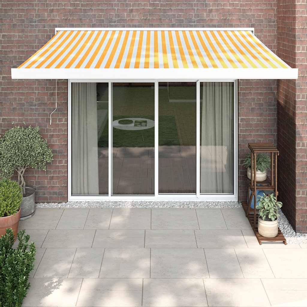 vidaXL Toldo retráctil aluminio y tela amarillo y blanco 3,5x2,5 m