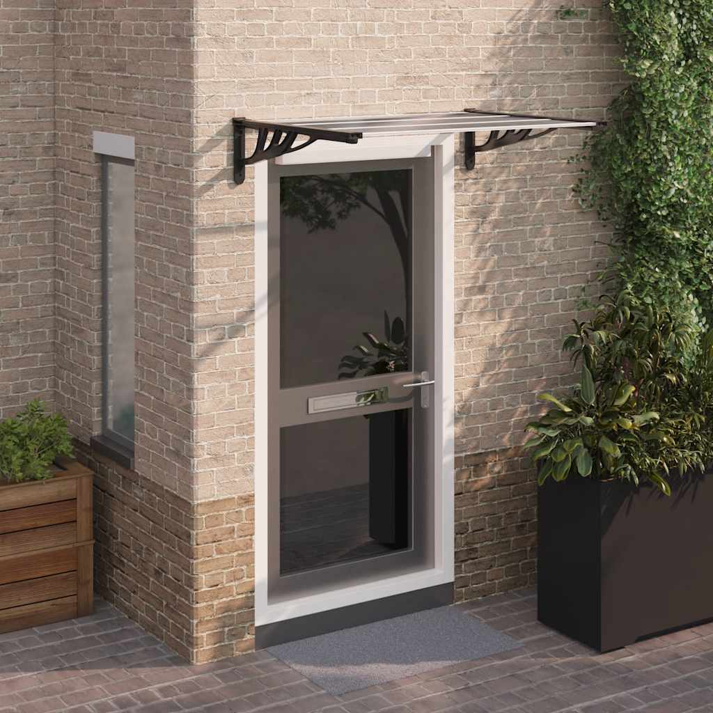 vidaXL Marquesina puerta policarbonato negro y transparente 122x90 cm