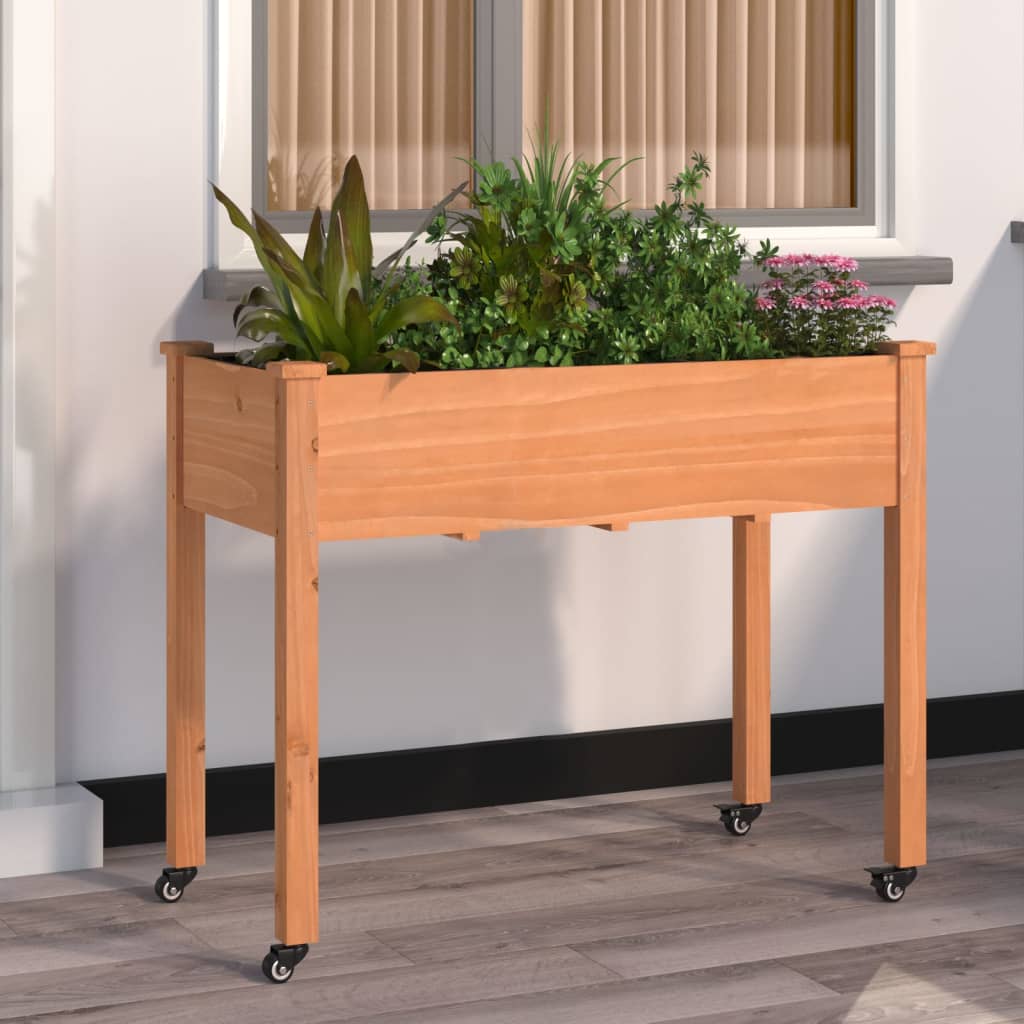 vidaXL Jardinera con forro y ruedas madera abeto marrón 118x59x80 cm