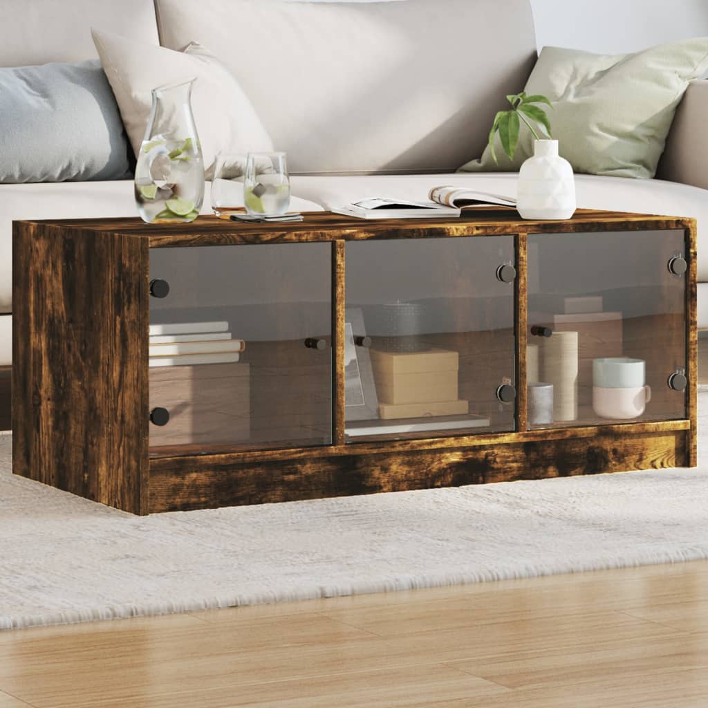 vidaXL Mesa de centro con puertas de vidrio roble ahumado 102x50x42 cm