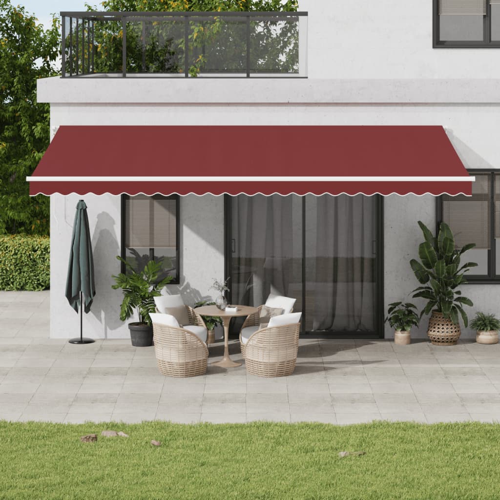 vidaXL Toldo retráctil manual con luces LED burdeos 600x350 cm