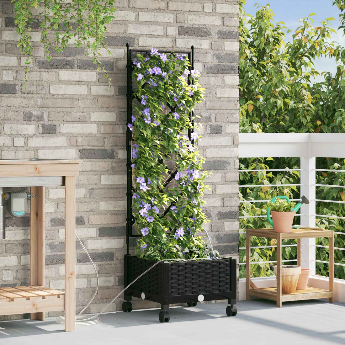 vidaXL Maceta de jardín con riego y ruedas Negro 40 x 40 x 132 cm PP