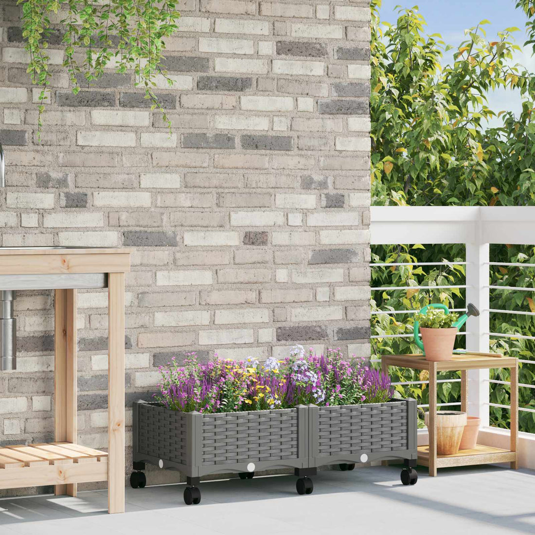 vidaXL Macetero de Jardín con Ruedas Gris Claro 80 x 40 x 33 cm PP