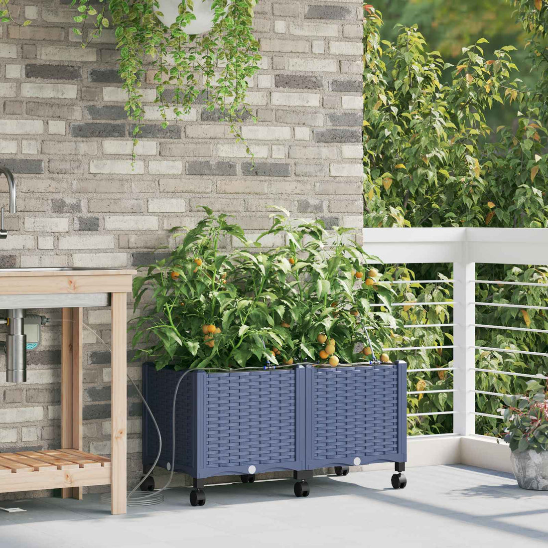 vidaXL Maceta de jardín con riego y ruedas 2 uds. Gris PP