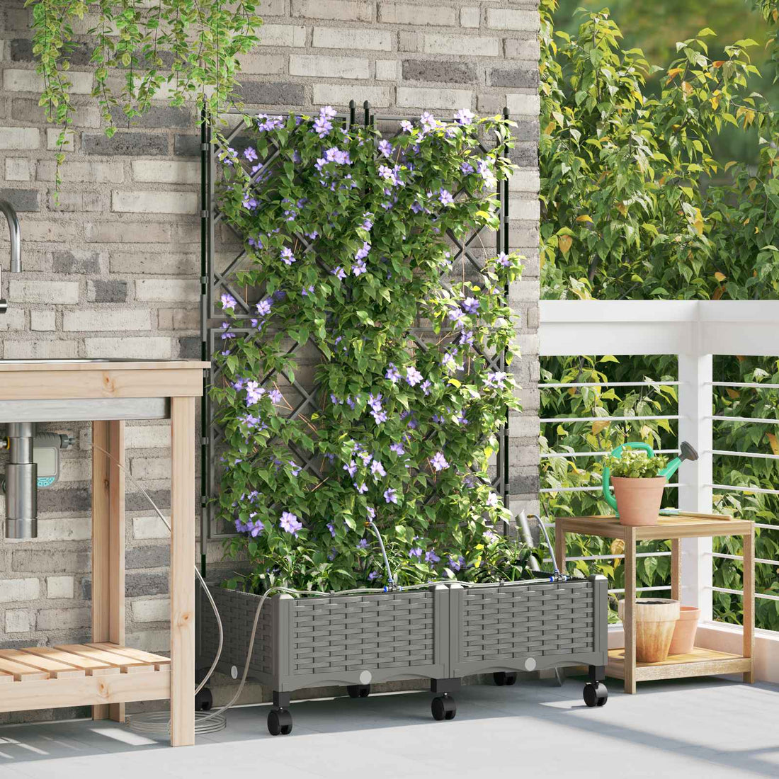 vidaXL Maceta de jardín con riego y ruedas 2 uds. Gris Claro PP