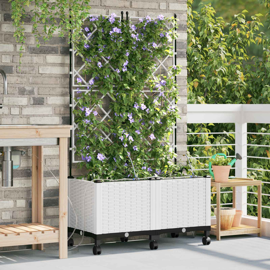 vidaXL Maceta de jardín con riego y ruedas 2 uds. Blanco PP