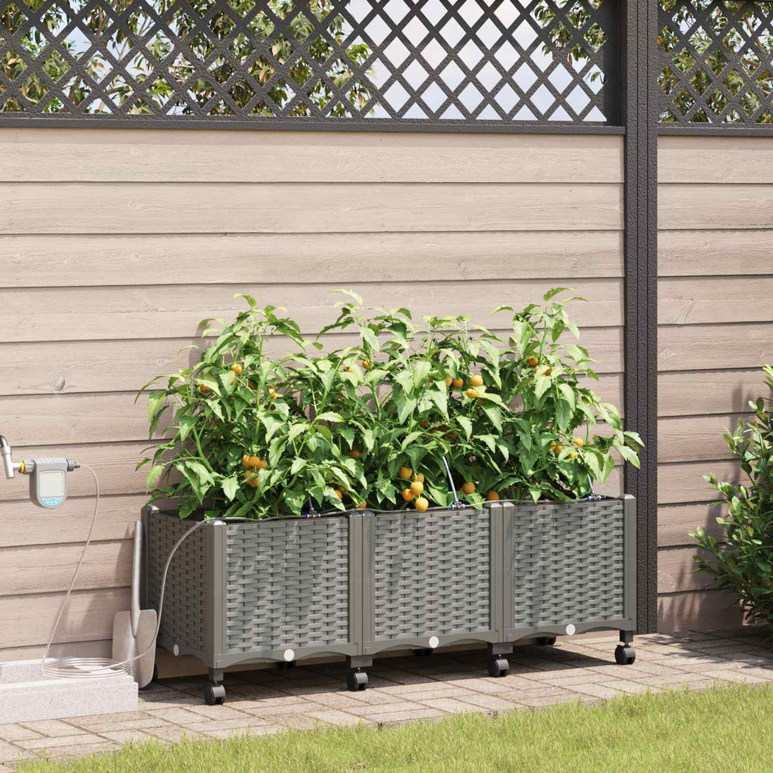 vidaXL Maceta de jardín con riego y ruedas 3 uds. Gris Claro PP